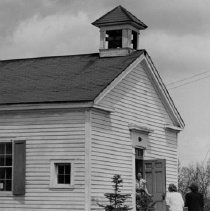 Teacher Mrs. Walter Parsons Greets Romeo High School Students
